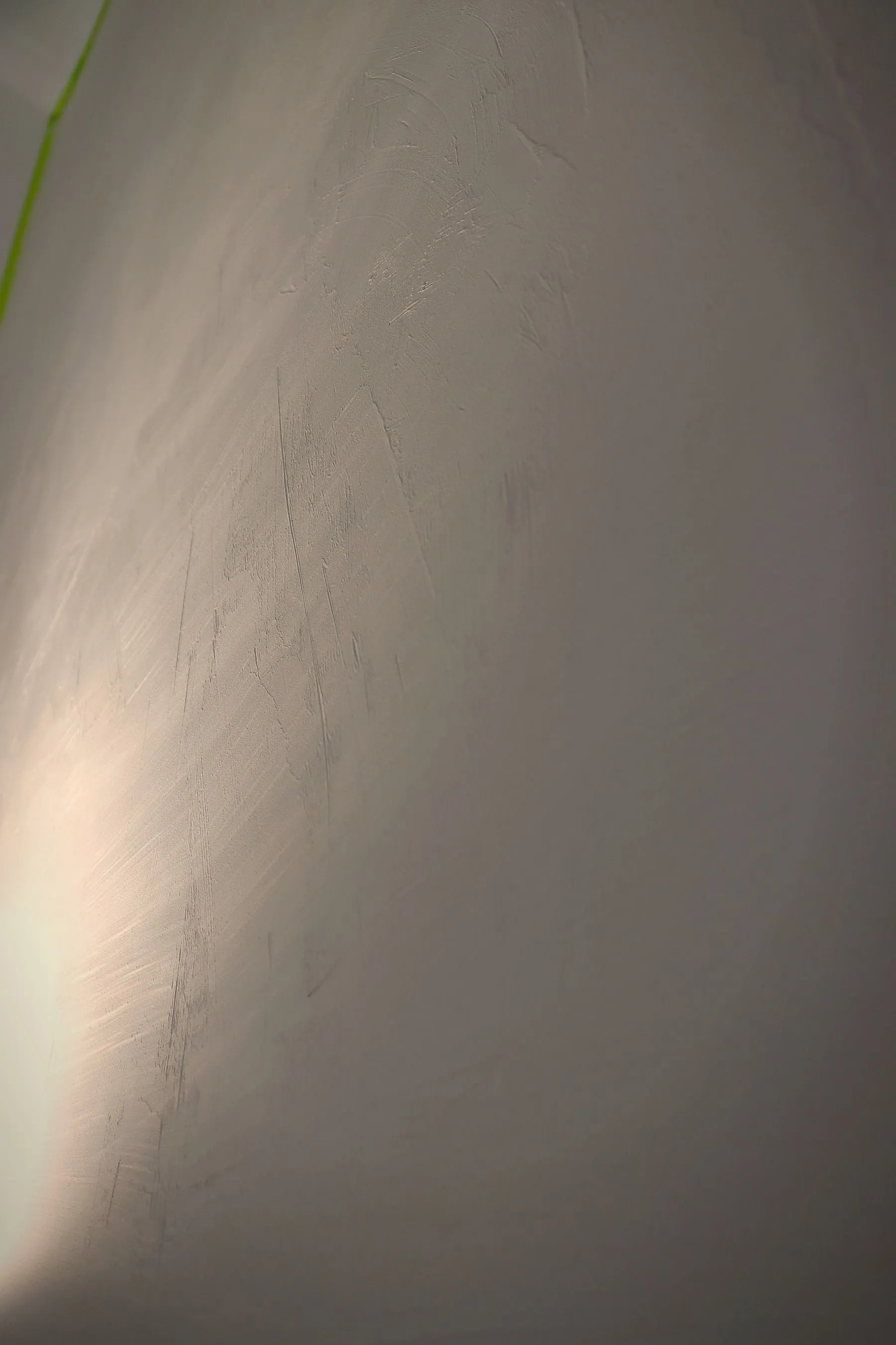 Hand-finished microcement surface detail by MONC