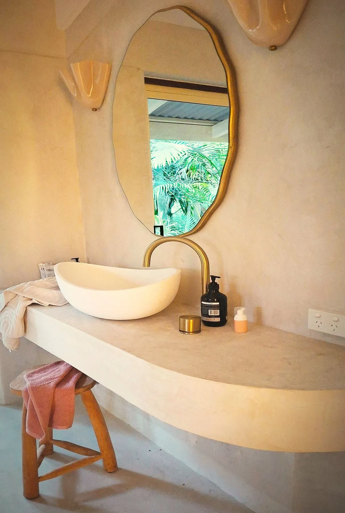 A finished microcement ensuite basin by MONC