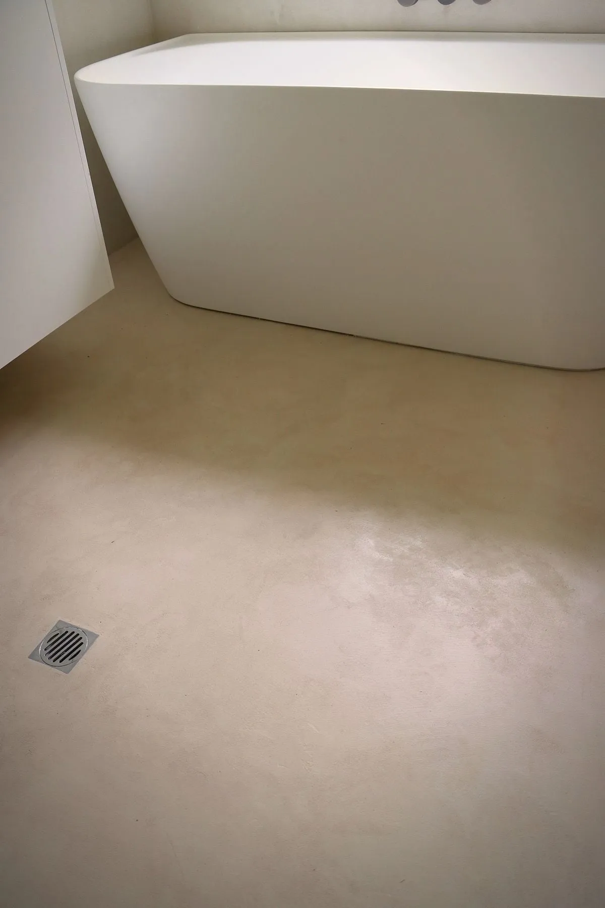 A finished MONC microcement interior with a seamless floor